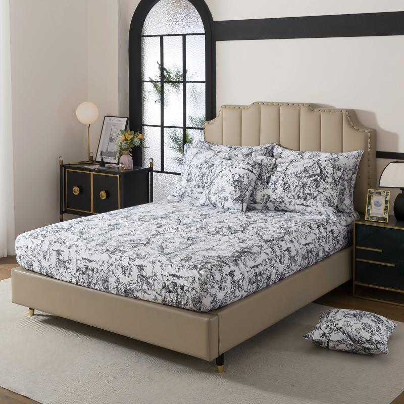 This bedroom features FADFAY's flat sheet, fitted sheet, and pillowcases.