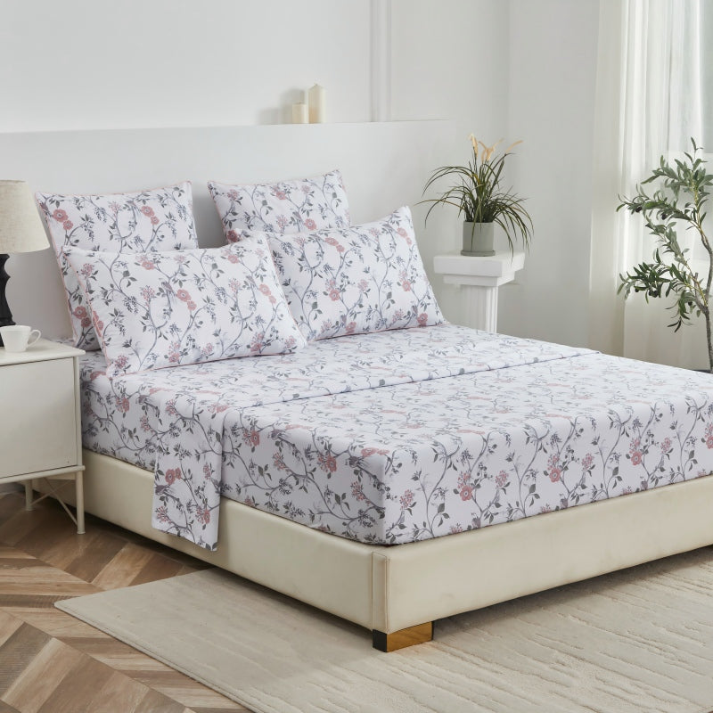 This bedroom features FADFAY's flat sheet, fitted sheet, and pillowcases.