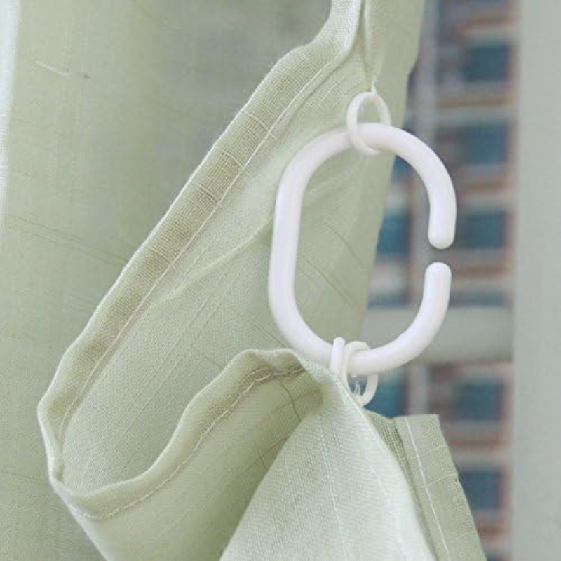 The design of the hooks on FADFAY's blackout curtains makes them easier to secure to the rod.