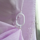 The design of the hooks on FADFAY's blackout curtains makes them easier to secure to the rod.