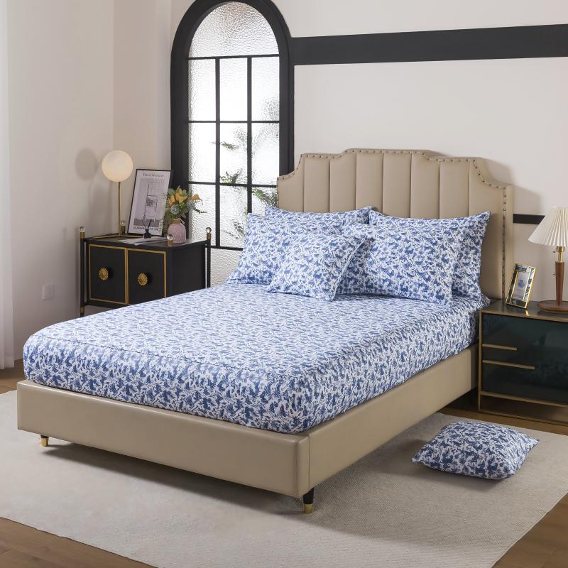 This bedroom features FADFAY's flat sheet, fitted sheet, and pillowcases.