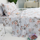 This bedroom features FADFAY's flat sheet, fitted sheet, and pillowcases.