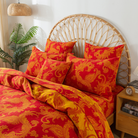 his FADFAY Duvet Cover Set features a vibrant combination of red and gold tones