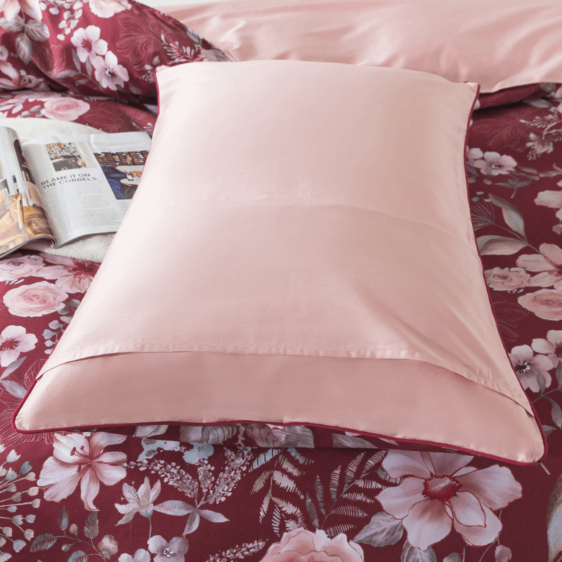 The back side of this FADFAY pillowcase is primarily pure pink.