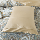 The back of the FADFAY starry sky pillowcase is primarily beige and easy to remove.